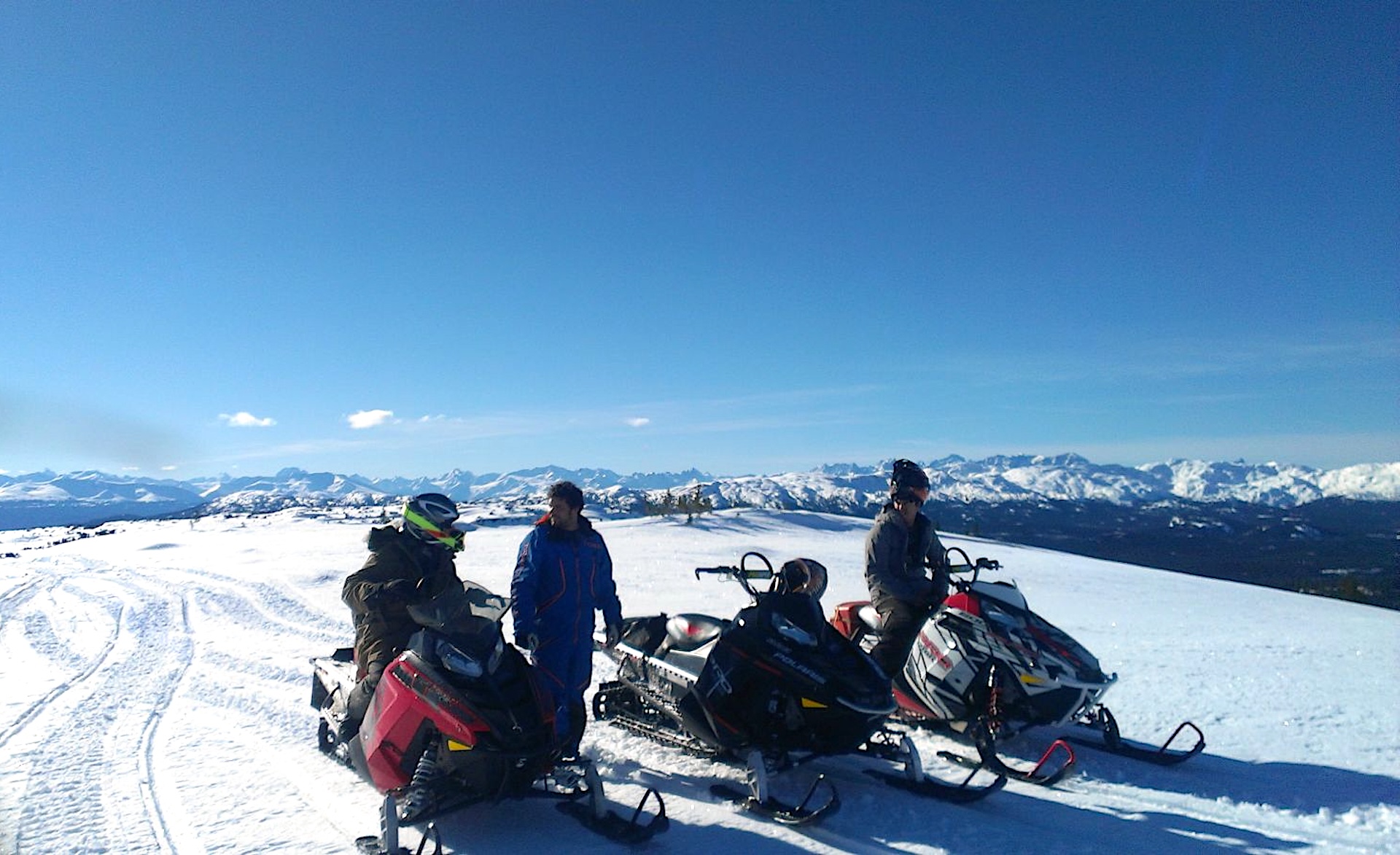 Snowmobiling in the Rainbow Range Mountains